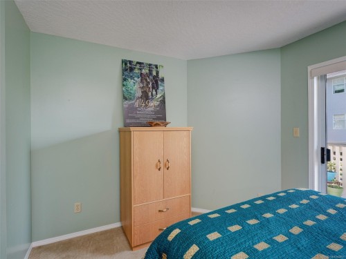#208-9882 Fifth St, Sidney, BC - Indoor Photo Showing Bedroom