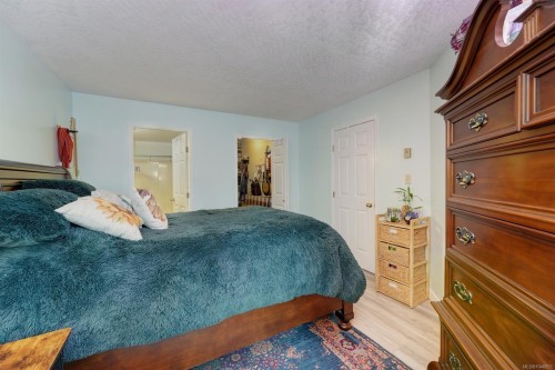 #208-9882 Fifth St, Sidney, BC - Indoor Photo Showing Bedroom