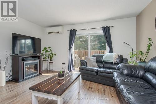 5 - 90 Ferman Drive, Guelph, ON - Indoor Photo Showing Living Room With Fireplace