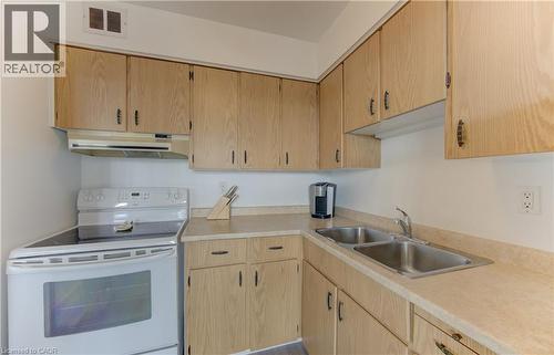 24 Midland Drive Unit# 403, Kitchener, ON - Indoor Photo Showing Kitchen With Double Sink