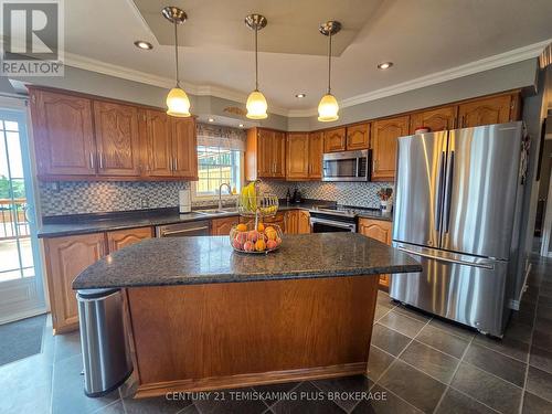 045090 Highway 562, Timiskaming (Tim - Outside - Rural), ON - Indoor Photo Showing Kitchen With Stainless Steel Kitchen With Double Sink