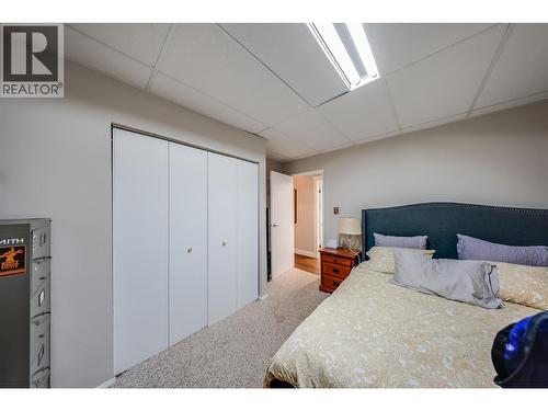 314 Webster Road, Fruitvale, BC - Indoor Photo Showing Bedroom