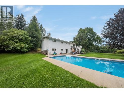 314 Webster Road, Fruitvale, BC - Outdoor With In Ground Pool With Backyard