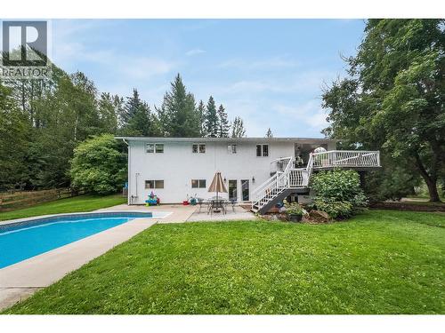 314 Webster Road, Fruitvale, BC - Outdoor With In Ground Pool With Backyard