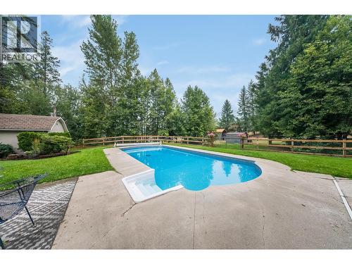 314 Webster Road, Fruitvale, BC - Outdoor With In Ground Pool With Backyard
