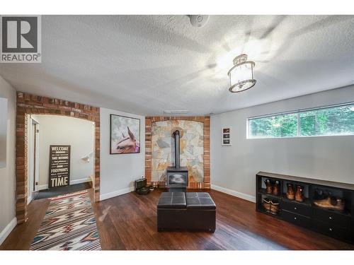 314 Webster Road, Fruitvale, BC - Indoor Photo Showing Other Room With Fireplace
