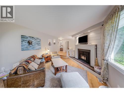 314 Webster Road, Fruitvale, BC - Indoor Photo Showing Living Room With Fireplace