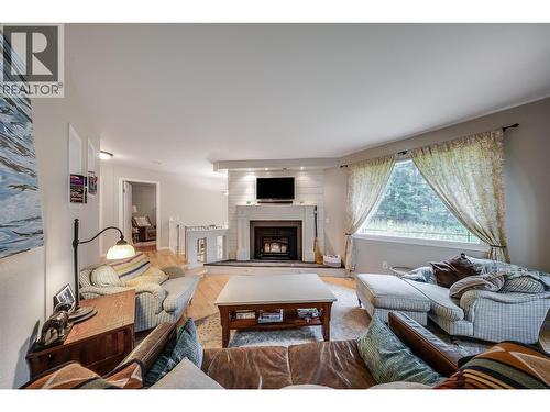 314 Webster Road, Fruitvale, BC - Indoor Photo Showing Living Room With Fireplace