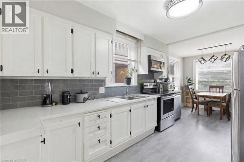 35 Centennial Parkway S, Hamilton, ON - Indoor Photo Showing Kitchen With Double Sink