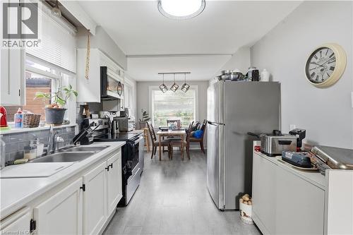 35 Centennial Parkway S, Hamilton, ON - Indoor Photo Showing Kitchen With Double Sink