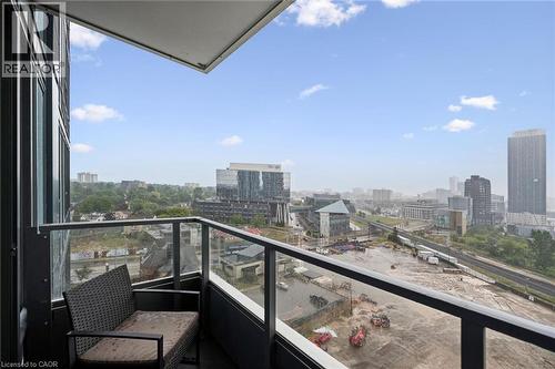 Private balcony with glass railing and durable flooring - 15 Wellington Street S Unit# 903, Kitchener, ON - Outdoor With Balcony With View With Exterior