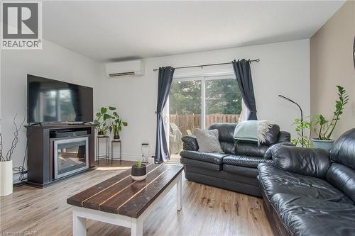 90 Ferman Drive Unit# 5, Guelph, ON - Indoor Photo Showing Living Room With Fireplace