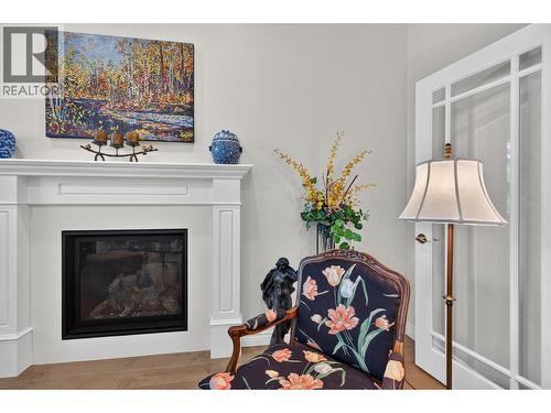 3901 Gallaghers Circle, Kelowna, BC - Indoor Photo Showing Living Room With Fireplace