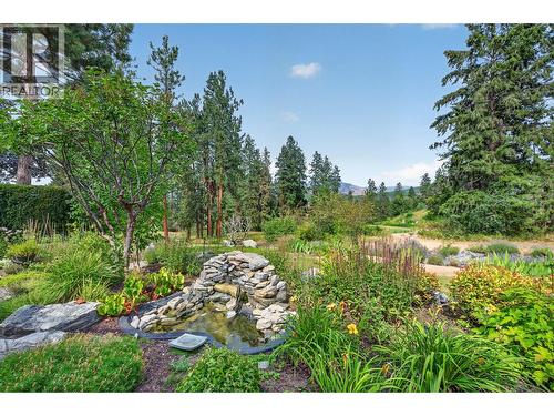 Parklike, with waterfall and pond - stunning views - 3901 Gallaghers Circle, Kelowna, BC - Outdoor