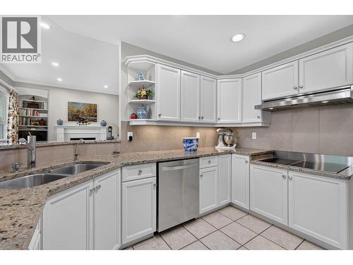 3901 Gallaghers Circle, Kelowna, BC - Indoor Photo Showing Kitchen With Double Sink