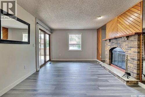 122 Edenwold Crescent, Regina, SK - Indoor With Fireplace