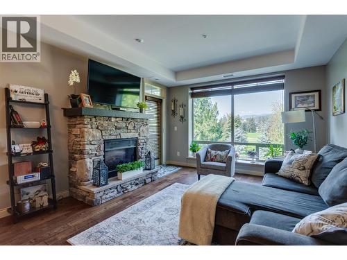 2760 Auburn Road Unit# 212, West Kelowna, BC - Indoor Photo Showing Living Room With Fireplace