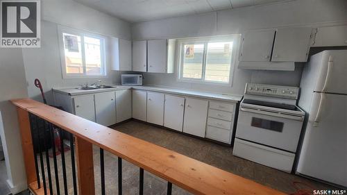 308 26Th Street, Saskatoon, SK - Indoor Photo Showing Kitchen With Double Sink