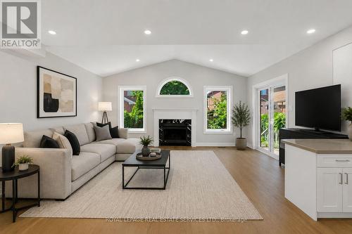 Photo is Virtually Staged - 3955 Foxwood Avenue, Mississauga, ON - Indoor Photo Showing Living Room With Fireplace