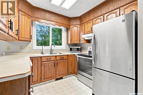619 Addie Crescent, Saskatoon, SK - Indoor Photo Showing Kitchen With Double Sink