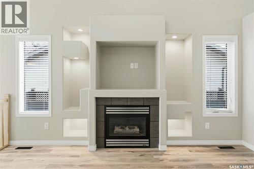 7323 Maple View Crescent, Regina, SK - Indoor Photo Showing Living Room With Fireplace