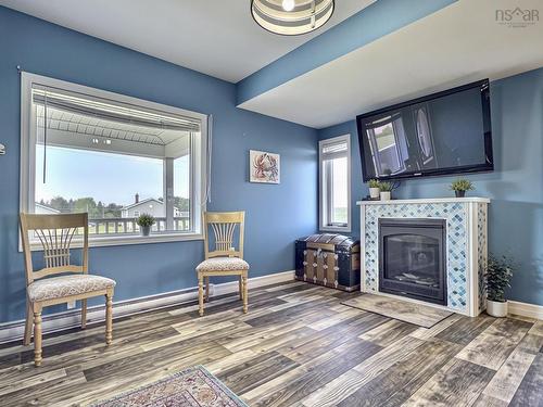 35 Chemin Broussard, Petit Étang, NS - Indoor Photo Showing Other Room With Fireplace