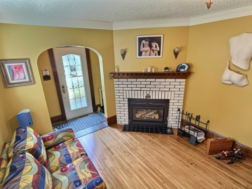 Boudoir - 116 Rue Taschereau E., Rouyn-Noranda, QC - Indoor Photo Showing Living Room With Fireplace