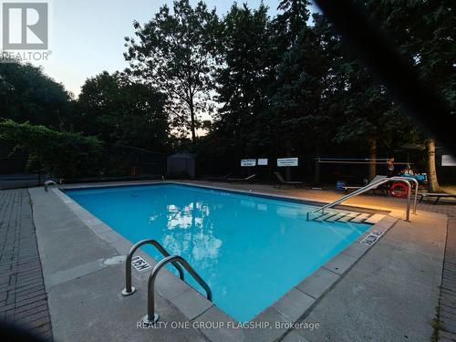 802 - 600 Rexdale Boulevard, Toronto, ON - Outdoor With In Ground Pool With Backyard