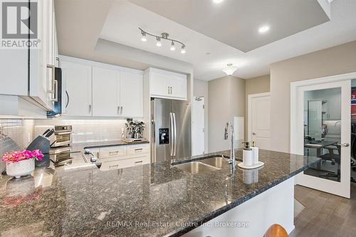 605 - 1878 Gordon Street, Guelph (Pineridge/Westminster Woods), ON - Indoor Photo Showing Kitchen With Stainless Steel Kitchen With Double Sink With Upgraded Kitchen