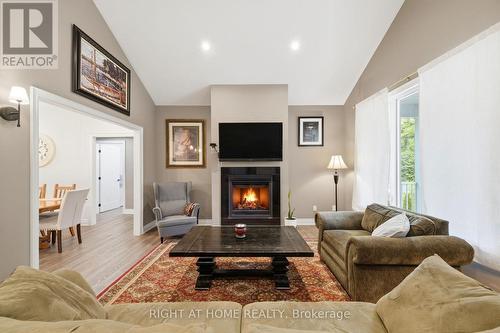 48 Nicole Boulevard, Tiny, ON - Indoor Photo Showing Living Room With Fireplace