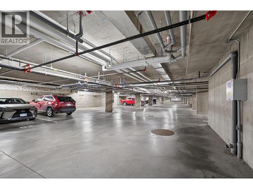Secured Parking - 881 Academy Way Unit# 312, Kelowna, BC - Indoor Photo Showing Garage