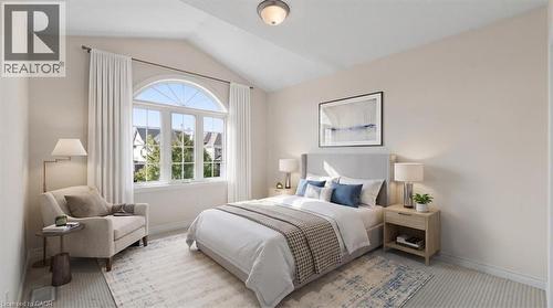 Vaulted ceiling, arched window, neutral wall tones, light-toned carpeting, recessed ceiling light fixture - 242 Moorlands Crescent, Kitchener, ON - Indoor Photo Showing Bedroom