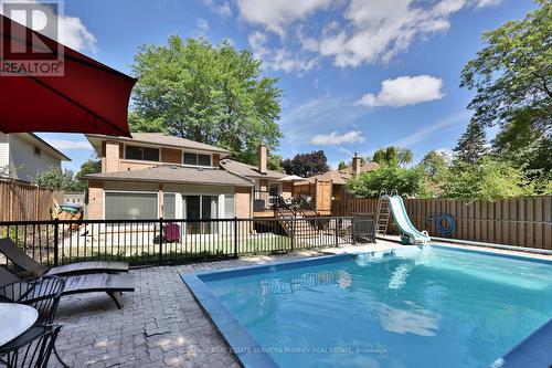 1404 Lewisham Drive, Mississauga, ON - Outdoor With In Ground Pool With Deck Patio Veranda
