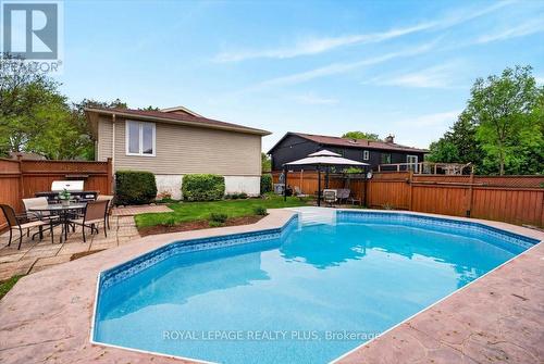 4452 Delaney Drive, Burlington, ON - Outdoor With In Ground Pool With Deck Patio Veranda With Backyard