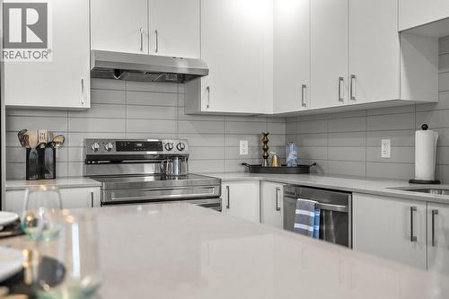 Photos are of a similar home; some features may vary - 1057 Frost Road Unit# 412, Kelowna, BC - Indoor Photo Showing Kitchen With Stainless Steel Kitchen With Upgraded Kitchen