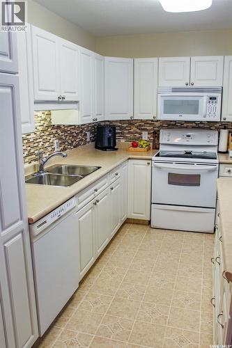 804 Alberta Street, Melfort, SK - Indoor Photo Showing Kitchen With Double Sink