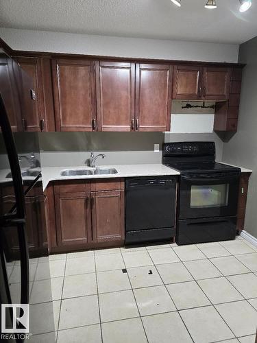 #601 9929 113 St Nw, Edmonton, AB - Indoor Photo Showing Kitchen With Double Sink