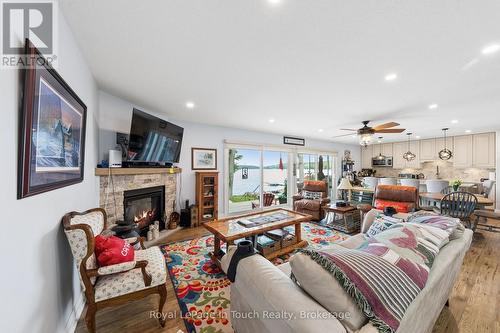 86 Andrew Drive, Tiny, ON - Indoor Photo Showing Living Room With Fireplace