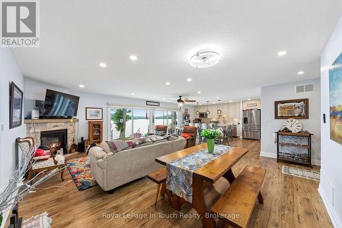 Open Concept - 86 Andrew Drive, Tiny, ON - Indoor Photo Showing Living Room With Fireplace