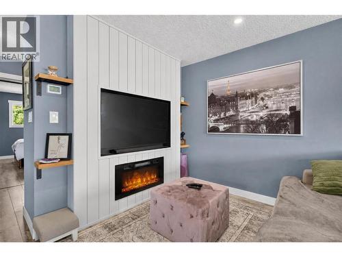 3703 Commonage Crescent, Vernon, BC - Indoor Photo Showing Living Room With Fireplace