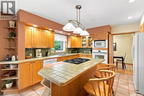 Crescent 211 David Knight Crescent, Saskatoon, SK - Indoor Photo Showing Kitchen With Double Sink