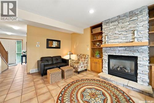 Crescent 211 David Knight Crescent, Saskatoon, SK - Indoor Photo Showing Living Room With Fireplace