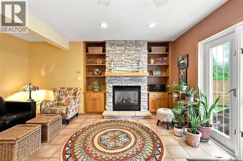 Crescent 211 David Knight Crescent, Saskatoon, SK - Indoor Photo Showing Living Room With Fireplace