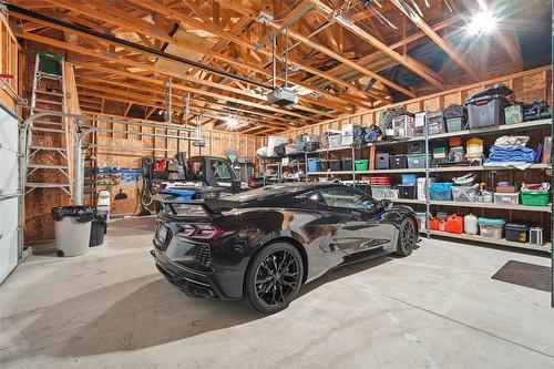 8 Orchard Gate, Oak Bluff, MB - Indoor Photo Showing Garage