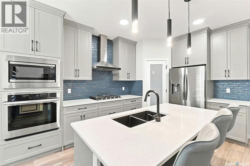 8718 Wheat Crescent, Regina, SK - Indoor Photo Showing Kitchen With Double Sink With Upgraded Kitchen