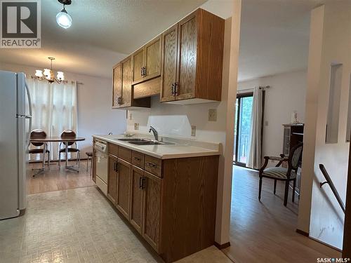 4 416 Heritage Drive, Estevan, SK - Indoor Photo Showing Kitchen With Double Sink