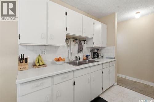 210 Lloyd Crescent, Saskatoon, SK - Indoor Photo Showing Kitchen With Double Sink