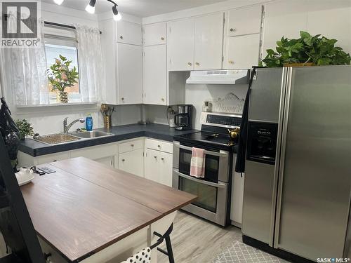 164 4Th Street W, Mankota, SK - Indoor Photo Showing Kitchen With Double Sink