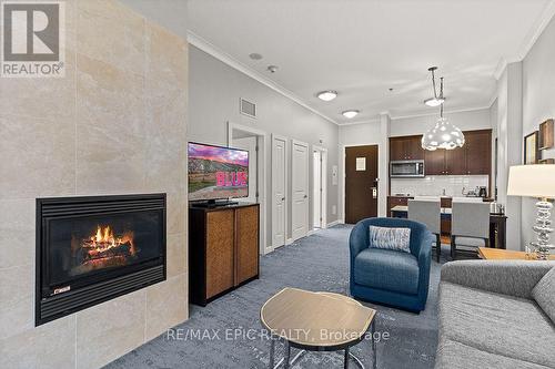 176 - 220 Gord Canning Drive, Blue Mountains, ON - Indoor Photo Showing Living Room With Fireplace
