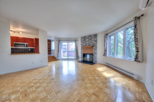 Salon - 201-2050 Rue De Magenta, Laval (Vimont), QC - Indoor Photo Showing Living Room With Fireplace